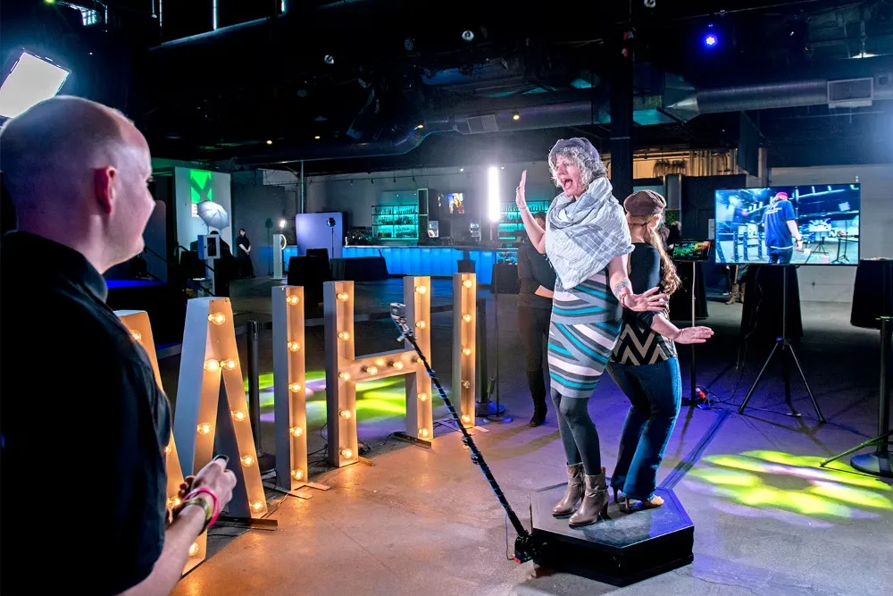 360 booth experience with custom branding and LED environments