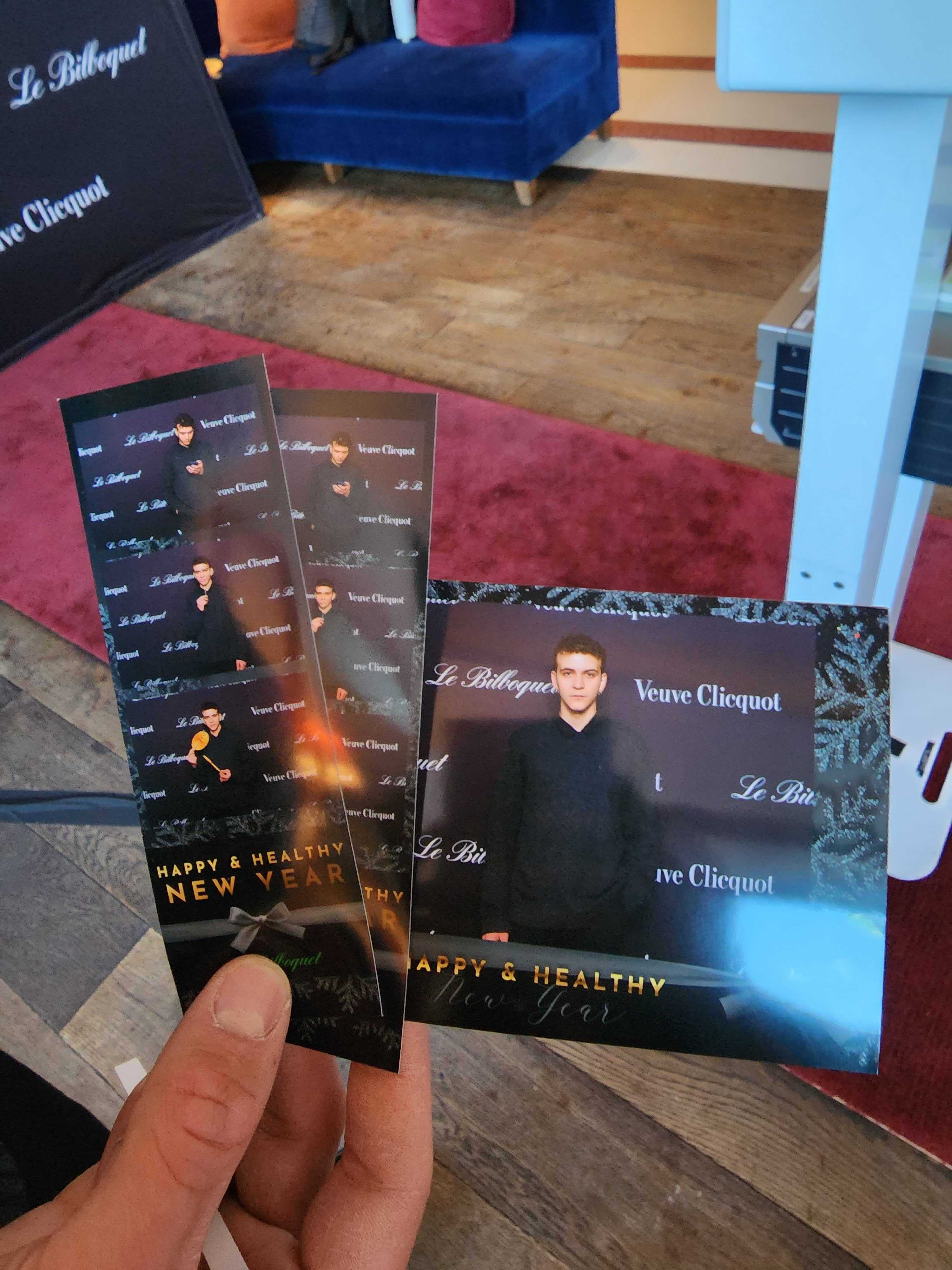 Printed out photos of an individual at an event