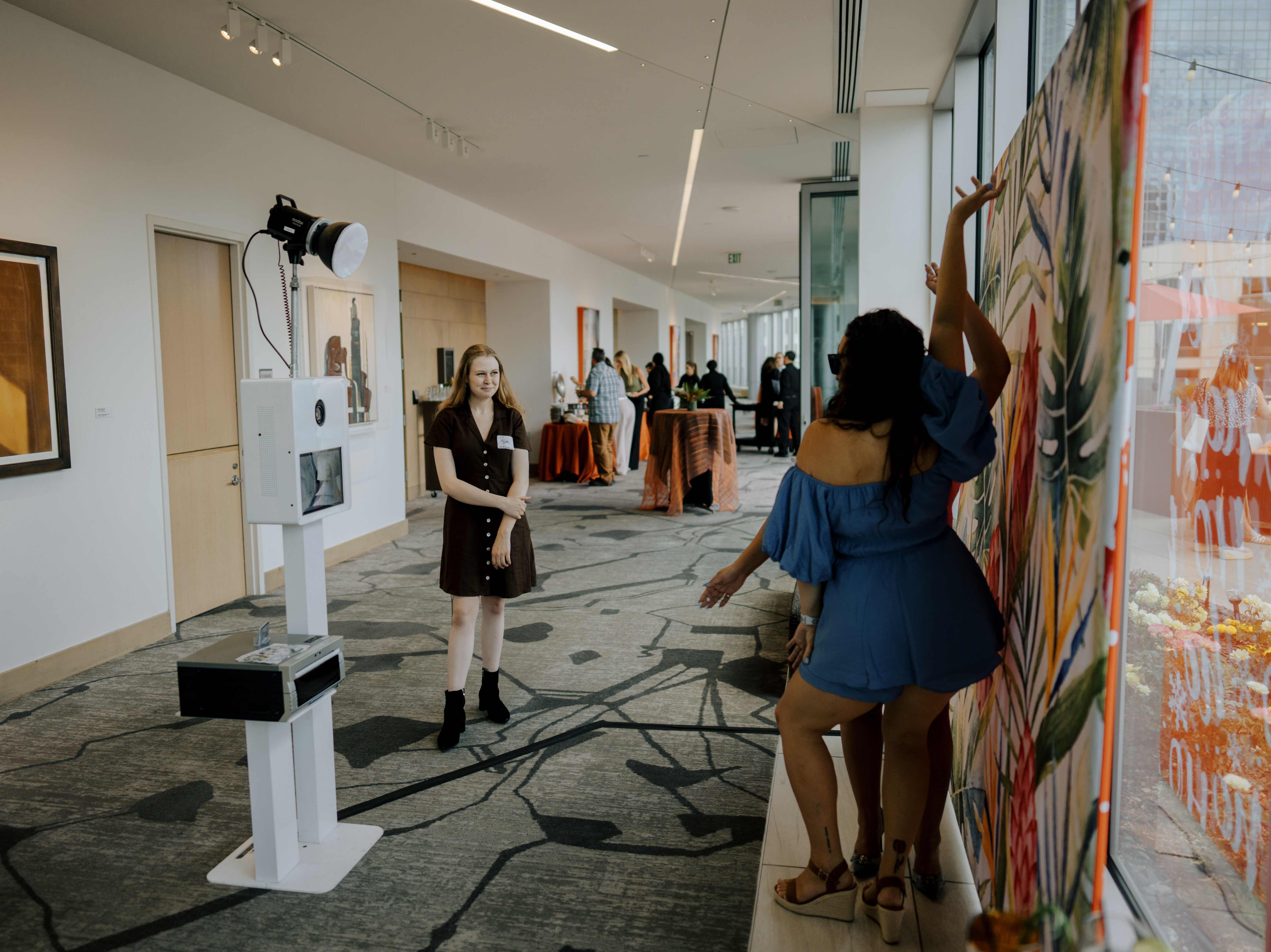 Classic photo booth with custom branding at corporate event