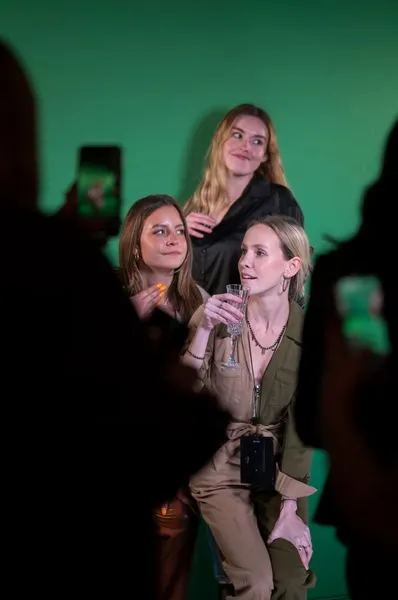 Sports fans celebrating in stadium environment green screen backdrop