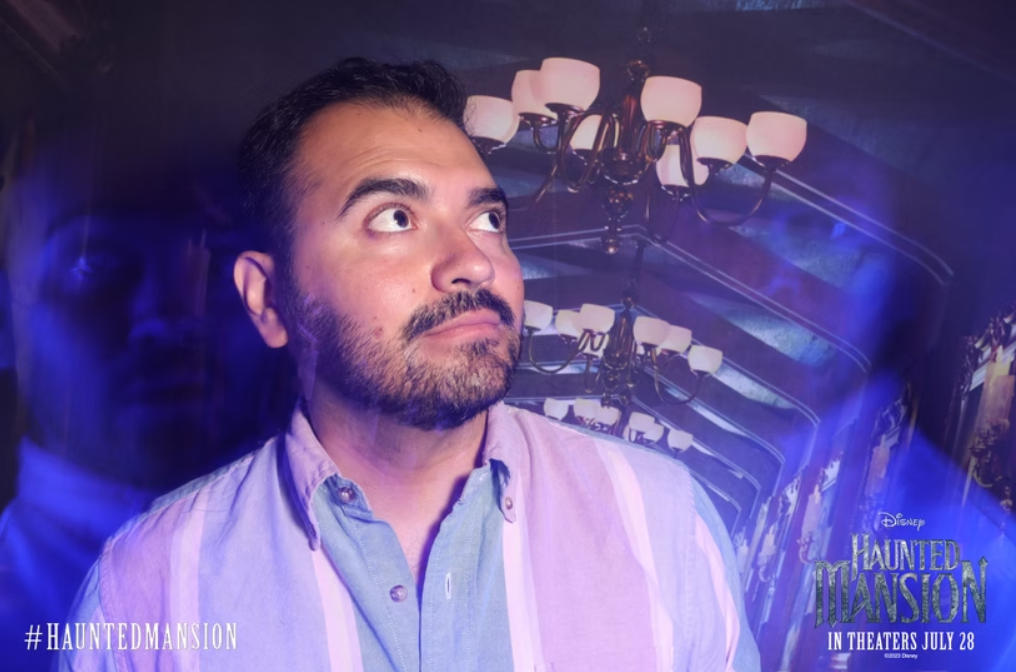 Haunted Mansion with ghosts flying all around