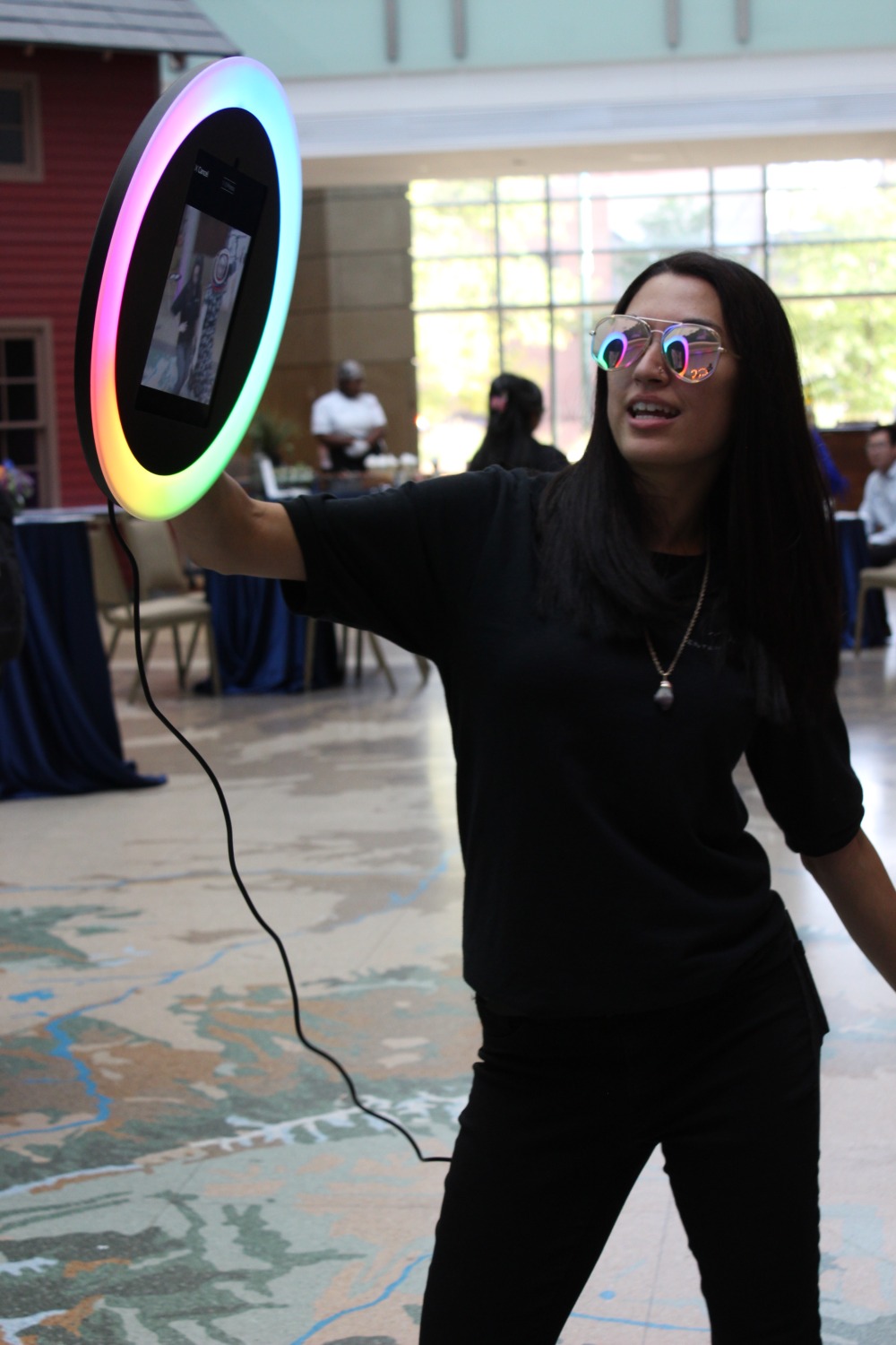 Roaming photo booth service capturing candid holiday moments at events