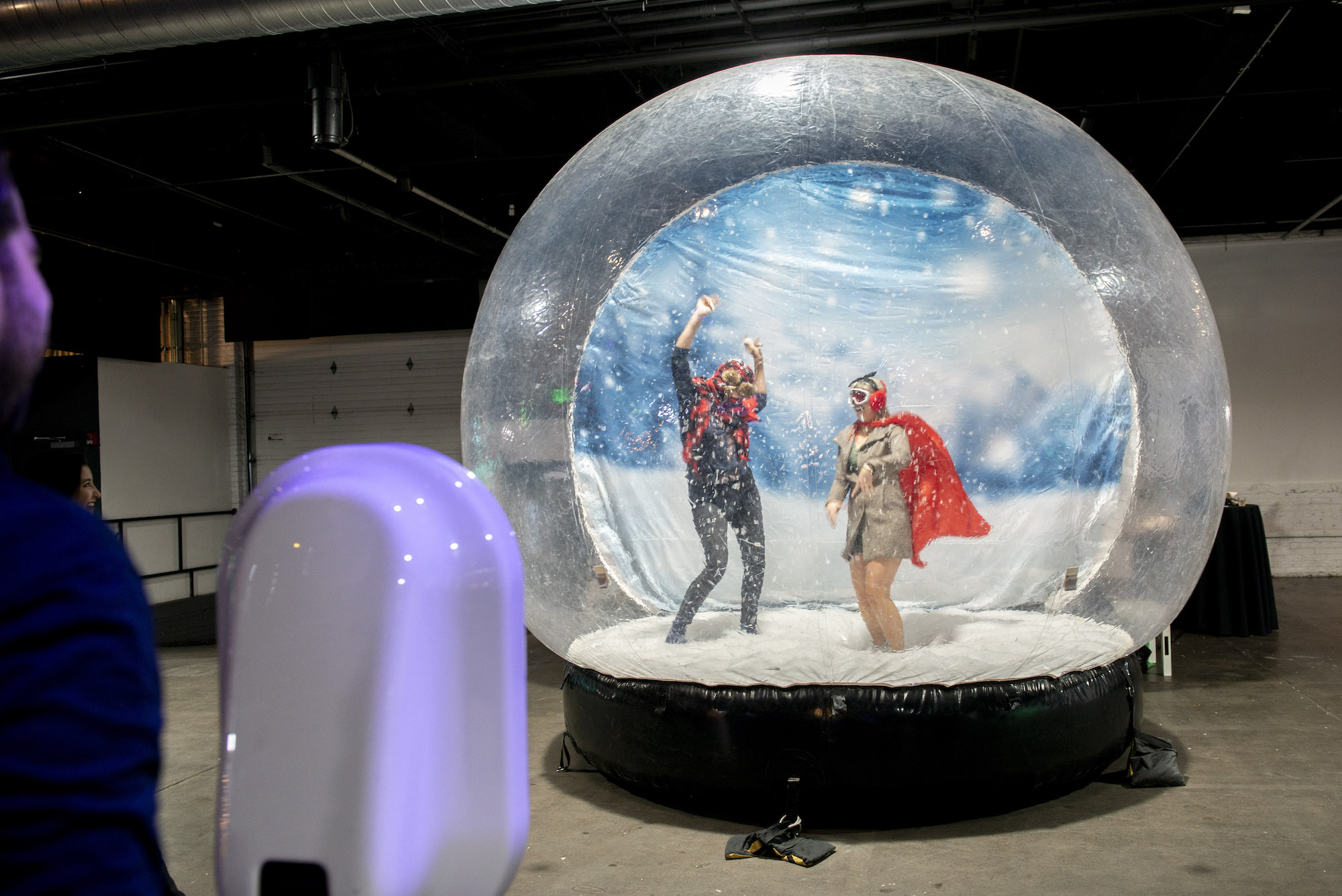 Snow globe themed photo set creating magical holiday memories