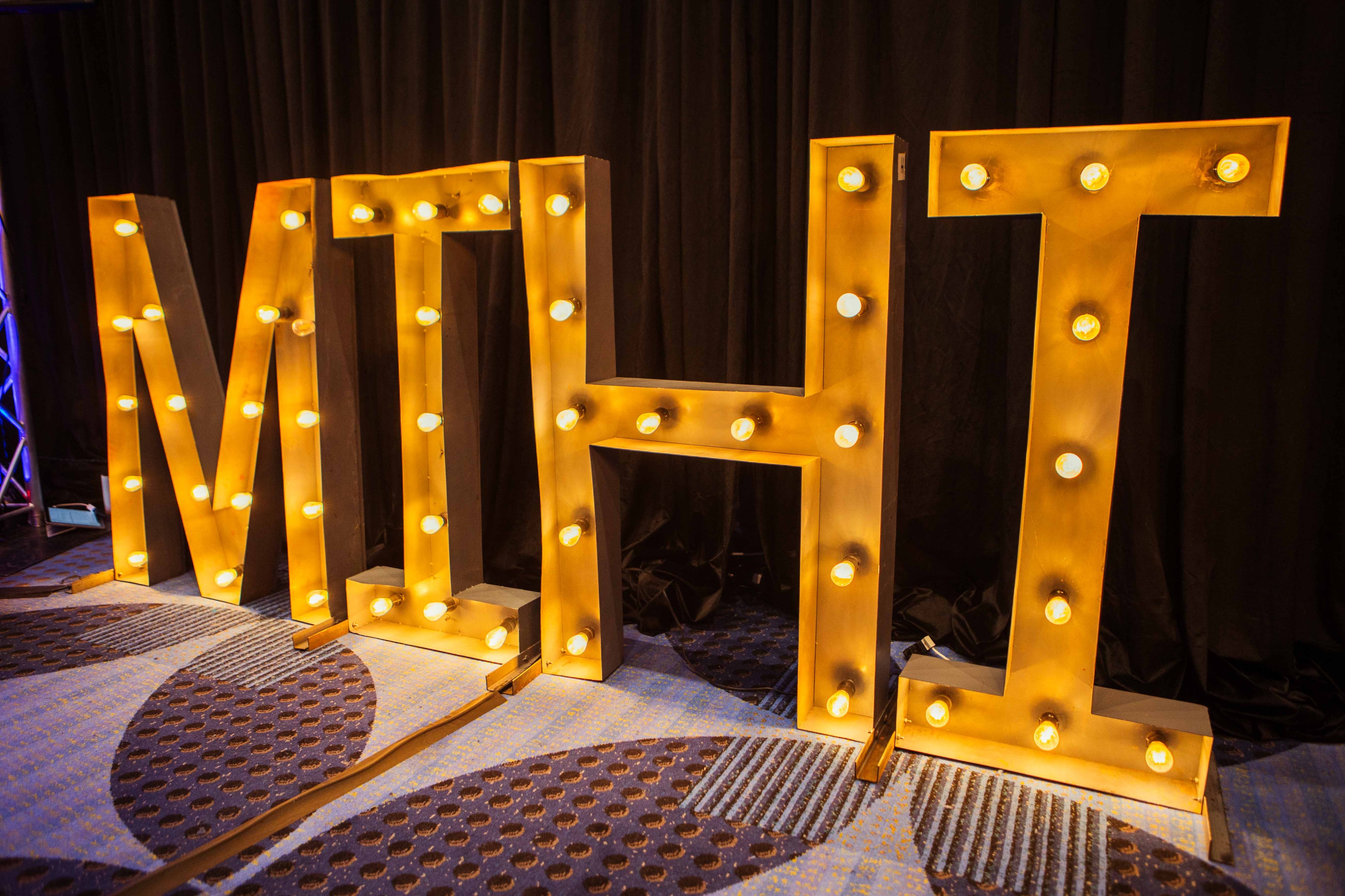 Custom marquee letters lighting up message for weddings and corporate brand activations