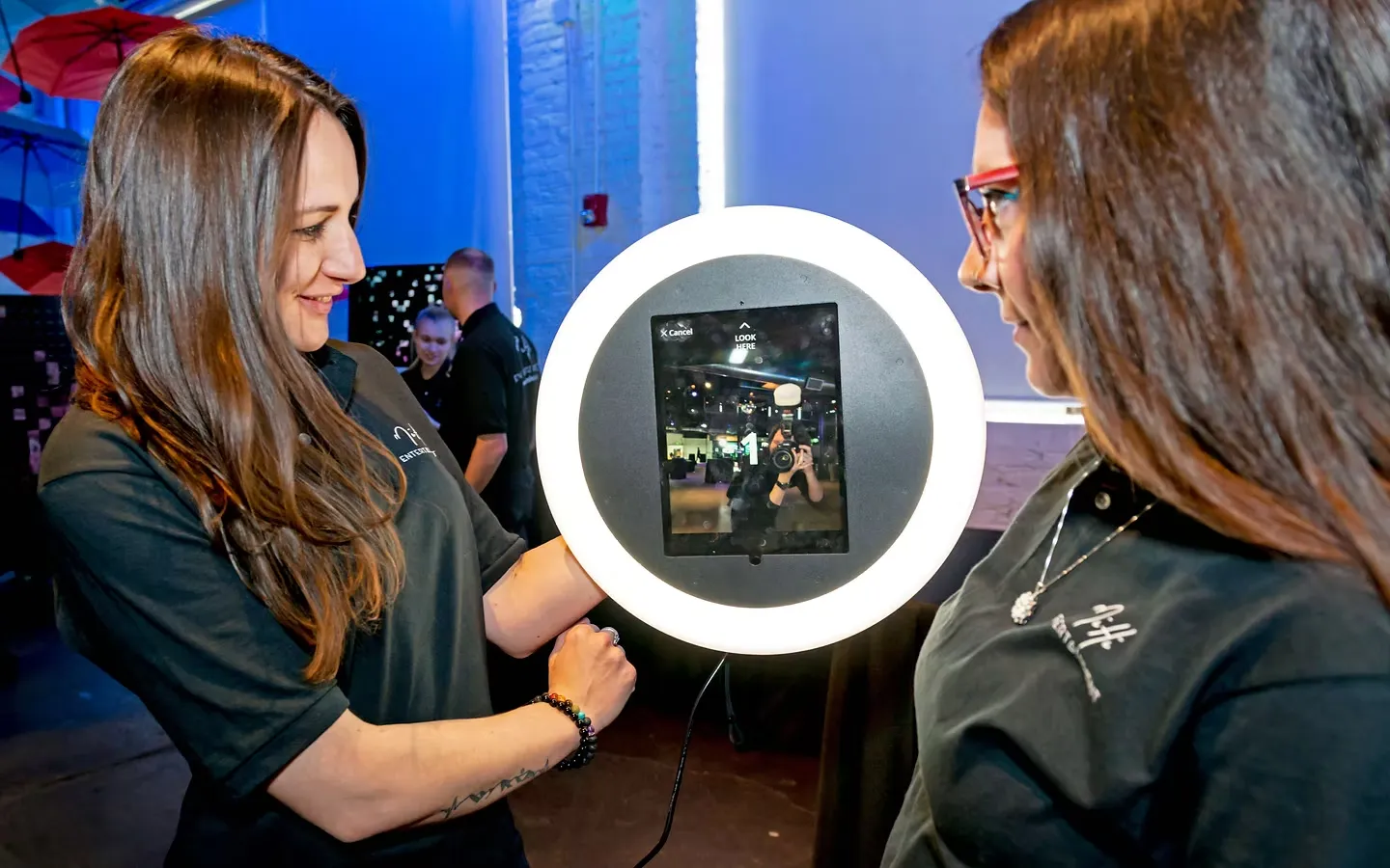 Roaming photo booth service with professional mobile photographers