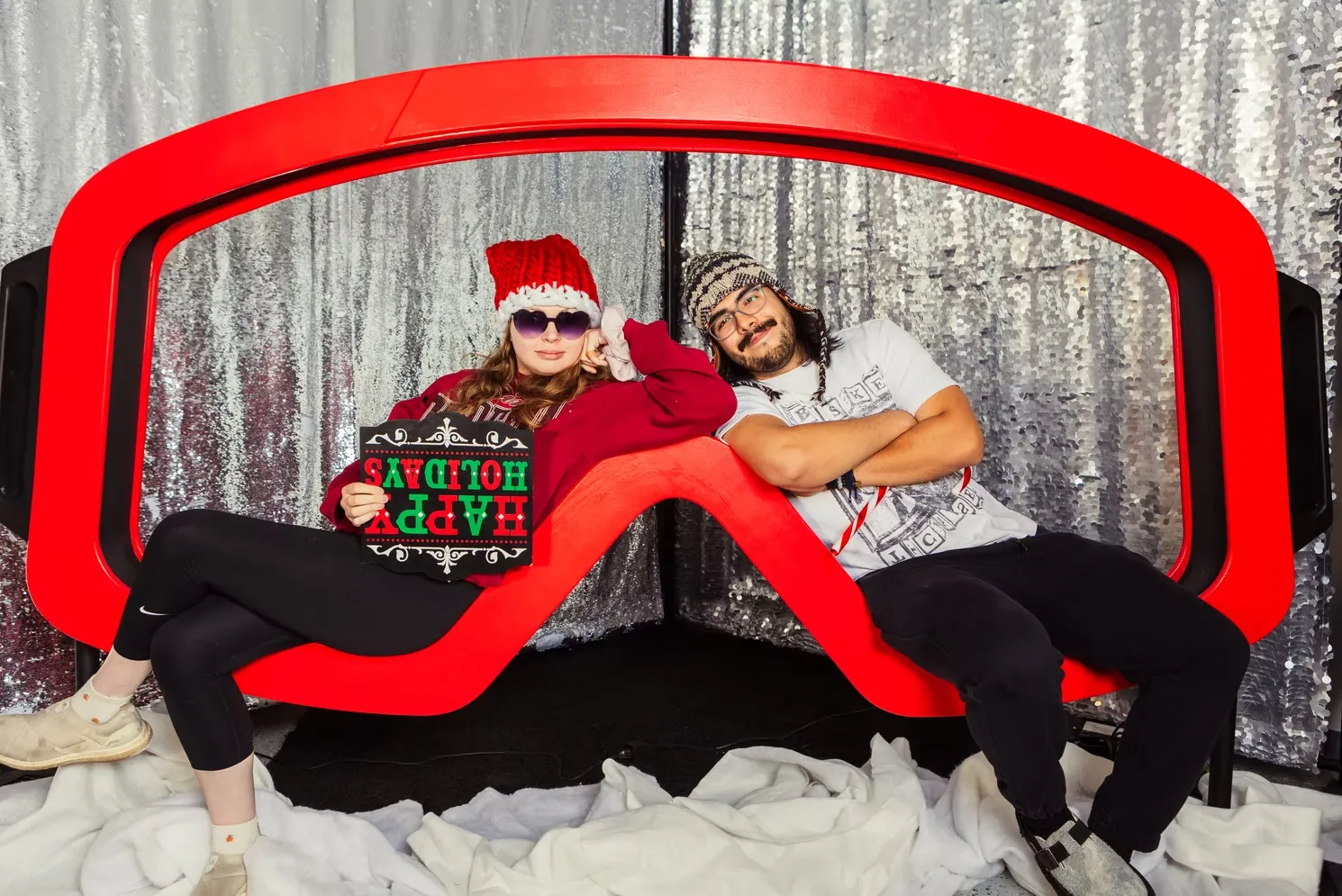 Winter wonderland photo booth with ski goggle theme and customizable accent lighting for parties