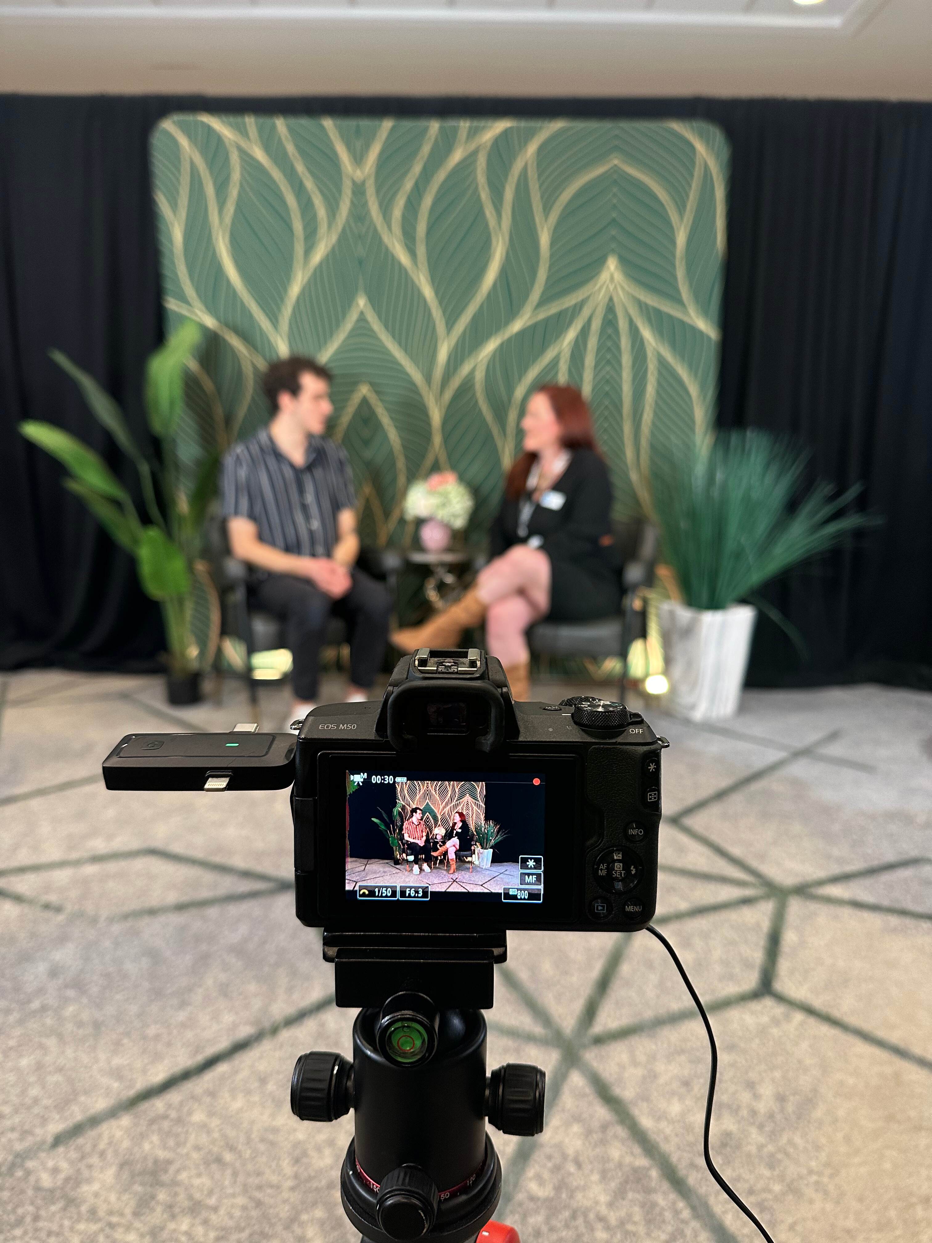 Video testimonial booth capturing attendee feedback at trade show